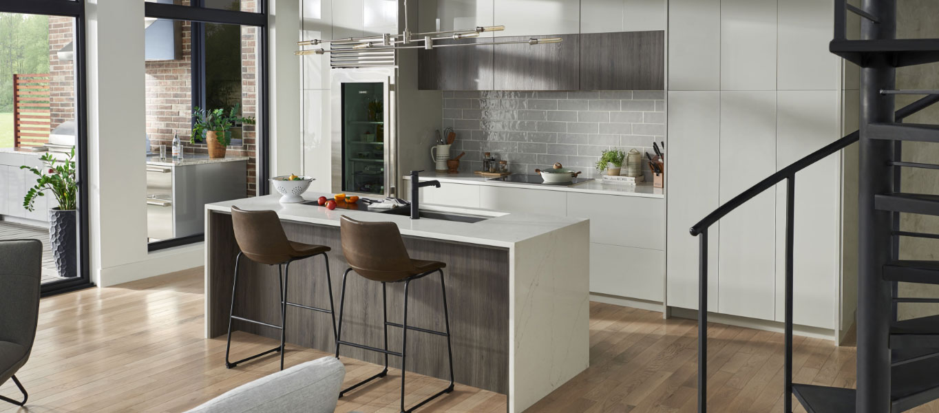 kitchen with quartz countertops, subway tile, and luxury vinyl plank flooring
