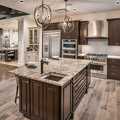 kitchen with brown cabinets and granite countertops