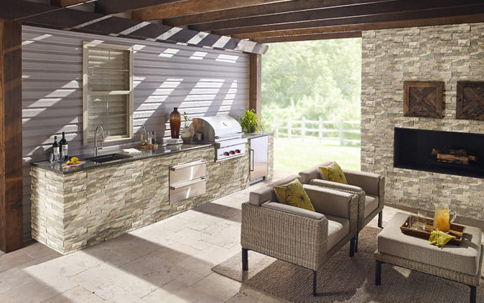 Outdoor Kitchen Featuring Stacked Stone and Pavers